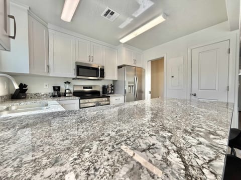 The kitchen in Unit 1