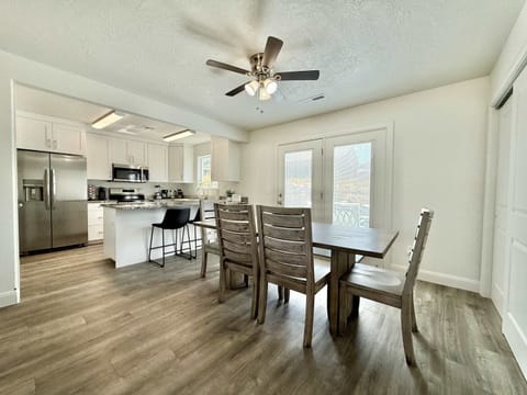 With room for 6 at the dining room table and additional seating at the bar, the dining room and kitchen have room for everyone