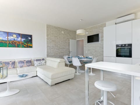 Furniture, Flooring, Interior Design, Floor, Ceiling, Room, Couch, Lighting, Table, Living Room