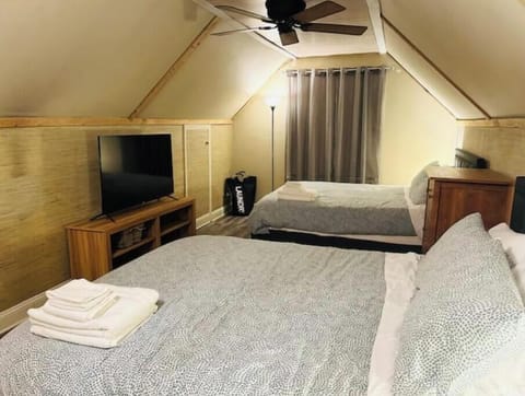 Cozy second-floor room with 2 queen beds.