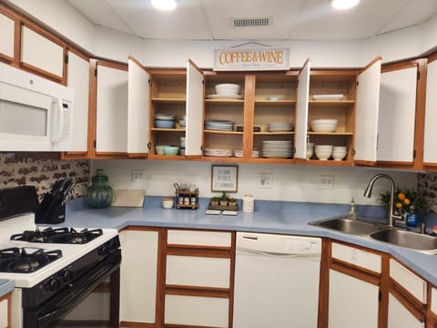 Well stocked kitchen for cooking.