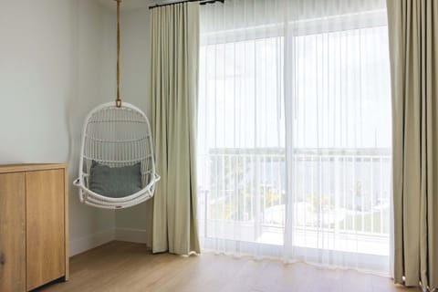 Bedroom 5 hanging chair & view