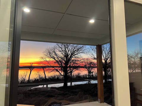 Both the living room and sitting room plus the event space open up to this huge, covered patio. A great place to visit; nosh; or sits and sip.