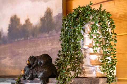 King bedroom with TV and full ensuite bathroom.