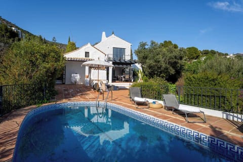 Exterior with private pool.
