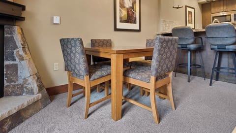 Intimate dining table for four guests.
