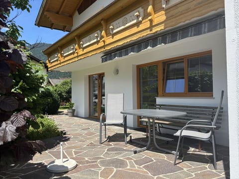 Flagstone, Shade, Flowerpot, Chair, Outdoor Furniture, Porch, Houseplant, Wood Stain, Eco Hotel, Yard