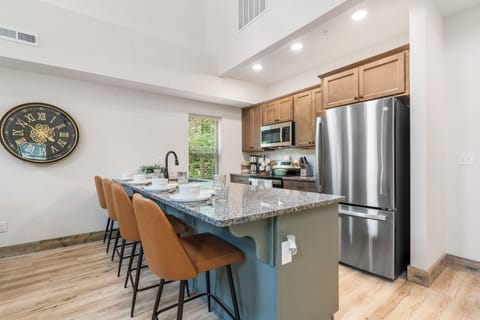 Full Kitchen with Upgraded Appliances, Additional Bar Seating