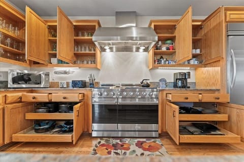 Kitchen: Main floor, drip coffee maker, Keurig, toaster, food processor, cooking utensils
