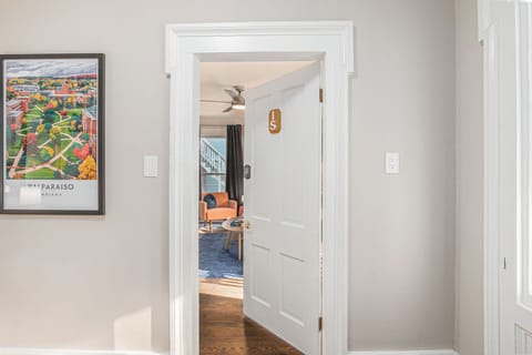 Access the unit from the shared foyer.