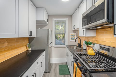 Fully stocked kitchen with cookware and all the essentials