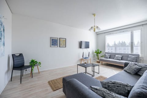 Living Room: Bright space with modern decor, perfect for relaxation or entertainment with views!