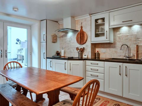 Furniture, Kitchen, Cabinetry, Interior Design, Flooring, Countertop, Wood, Kitchen Appliance, Major Appliance, Ceiling