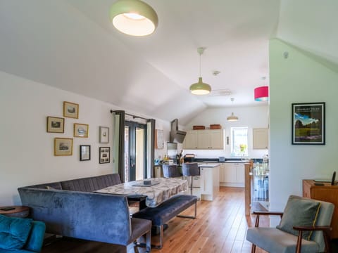 Furniture, Interior Design, Flooring, Wall, Floor, Wood, Ceiling, Light Fixture, Chair, Room