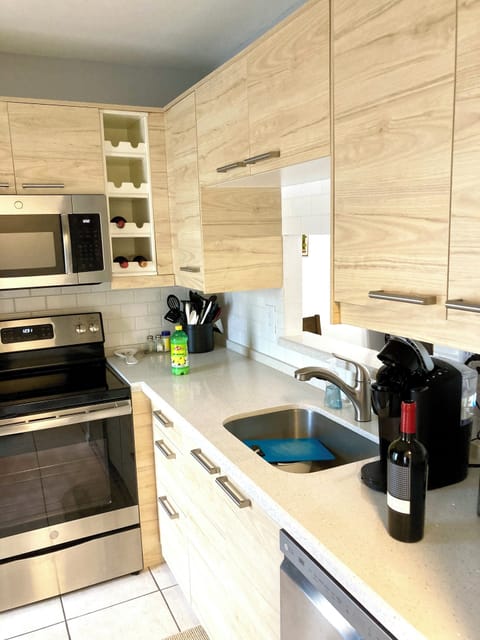 Kitchen including microwave, stove,dishwasher, coffee maker, toaster and more