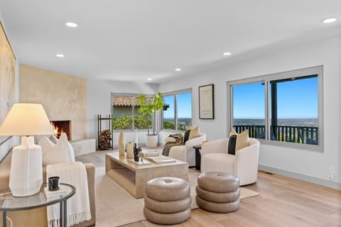 Lounge in luxury with plush seating and incredible panoramic city views