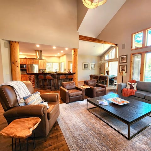 Living room with view of kitchen.