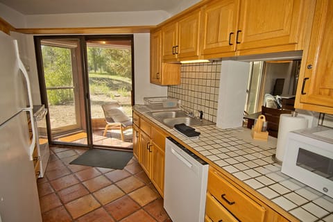 Full Kitchen with attached Sunroom