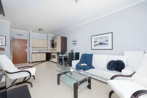 Another perspective on the bright space of the living area combined with the kitchenette.