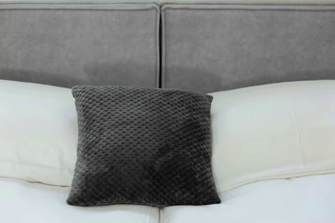 Soft pillows on the bed. 