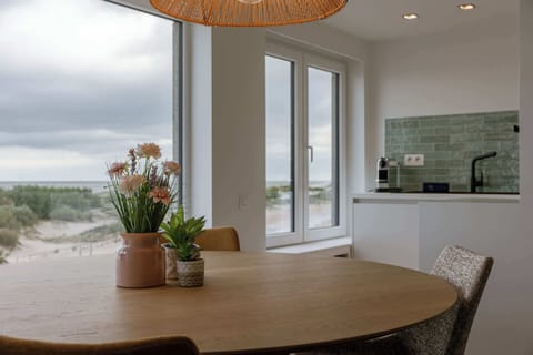 Seaside Dining Area with Sliding Door
