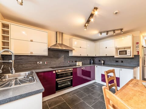 Furniture, Floor, Interior Design, Flooring, Apartment, Chair, Kitchen & Dining Room Table, Glass, Shade, Balcony