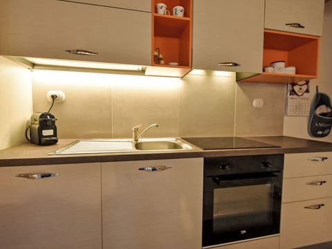 Kitchen, Kitchen Appliance, Wood, Countertop, Cabinetry, Interior Design, Major Appliance, Furniture, Home Appliance, Flooring