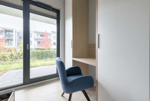 A practical desk setup with ample workspace, perfect for remote work or quiet reading.