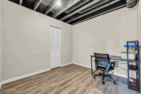 A dedicated office space provides a quiet and private area for focused work or study. Perfect for remote workers or business travelers.