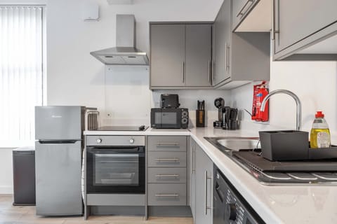 Well equipped Kitchen with washing machine, oven, hob, microwave, fridge, kettle, toaster, coffee maker and utensils