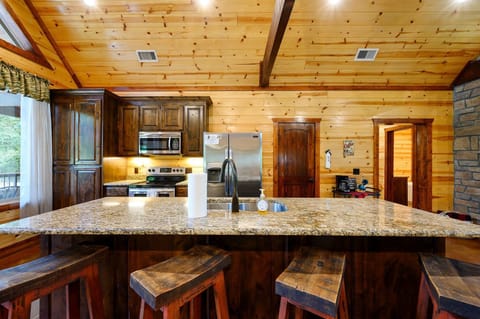 Sip morning coffee or grab a bite at the kitchen counter, seating 4