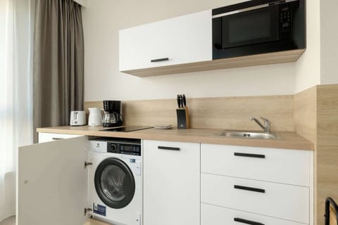 Built-in, in the kitchenette you will find a washing machine, which will be useful for longer stays.