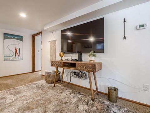 Enjoy movie nights in style with a large smart TV, offering crystal-clear picture quality and access to all your favorite streaming services.