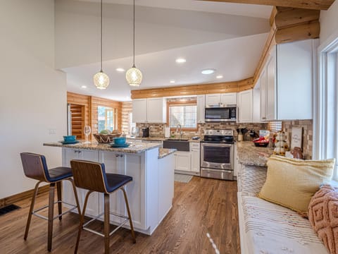 Whether you're preparing a family feast or a quiet meal, this kitchen is designed for comfort, style, and convenience.