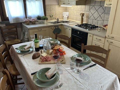 Furniture, Wood, Kitchen, Interior Design, Kitchen & Dining Room Table, Tableware, Countertop, Flooring, Kitchen Appliance, Dining Room