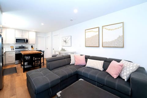 Living room with a comfortable couch, and a Smart TV