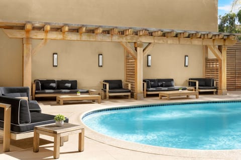 Lounge in shaded cabanas for cool, breezy poolside breaks.