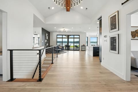 View from the foyer looking back through the house to the lake