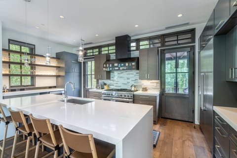 Fully appointed chefs kitchen with bar seating