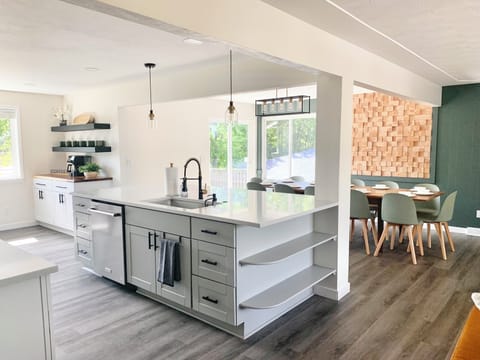 Kitchen: Large island w/ stools, sink & dishwasher