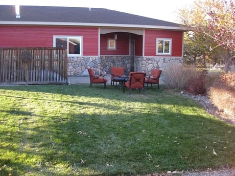 Outdoor breakfast nook off the kitchen, shared yard.