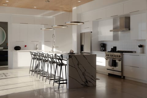 In the kitchen, the breakfast bar seats up to 5.