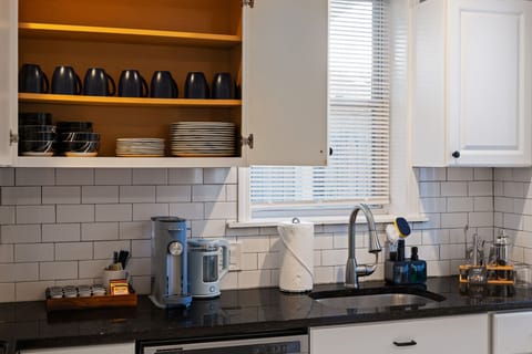 Dinnerware tucked neatly behind cupboards