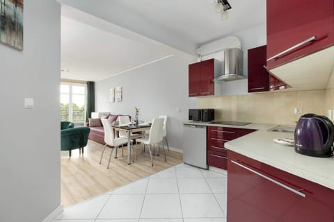 Fully equipped kitchenette with dining area.