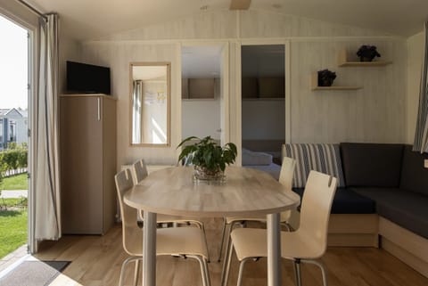 Bench with dining table from Holiday Park Klein Strand - Comfort Chalet 4p