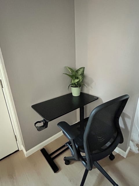 Work space with adjustable desk