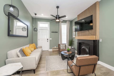 Curl up in the chic living room & stream your favorites on the smart TV