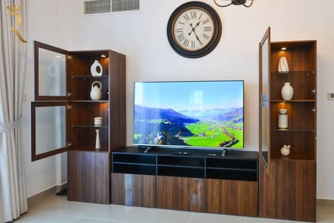 Relax in style with plush sofas and a large HD TV—your perfect spot to unwind after a day of exploring.