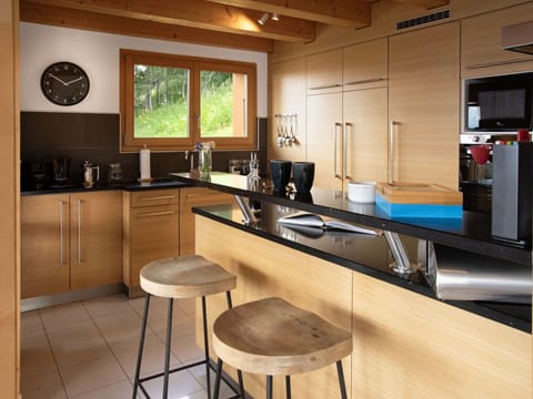 Furniture, Kitchen, Kitchen Appliance, Countertop, Cabinetry, Interior Design, Wood, Flooring, Major Appliance, Home