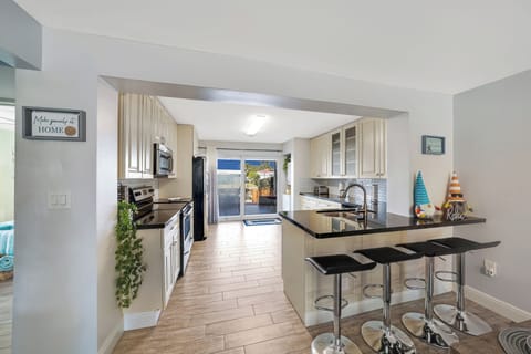 Indoor bar-style workspace with water views and A/C stay cool, and inspired.